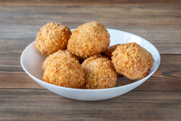 Bowl of breaded and deep fried Croquettes